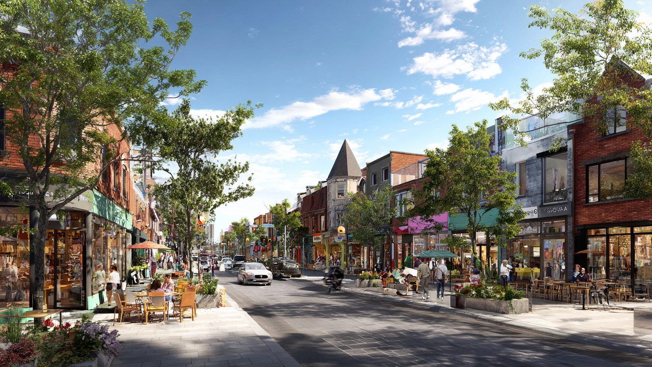 Bustling local shopping street with diverse small businesses, pedestrians, and vibrant community interaction during daytime.